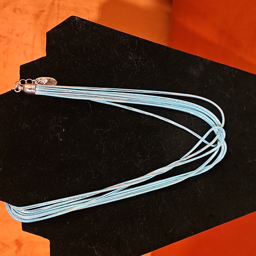 Gorgeous teal blue necklace. The metal on this necklace feels soft!